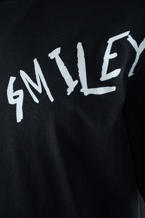 Card slide image -  CAMISETA DE SMILEY NEGRA CON MANGA CORTA GÉNERO NEUTRO