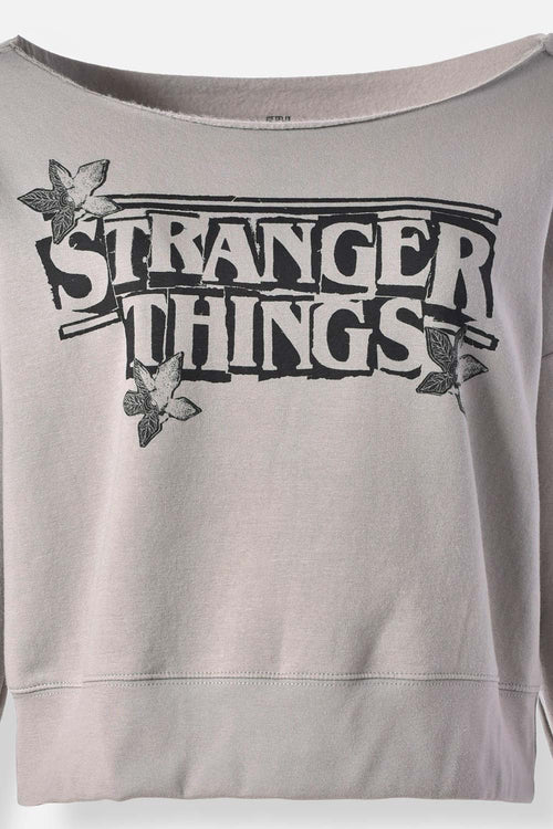 Card slide image -  BUZO DE STRANGER THINGS OVERSIZED FIT PARA MUJER