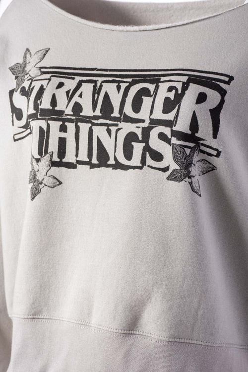 Card slide image -  BUZO DE STRANGER THINGS OVERSIZED FIT PARA MUJER